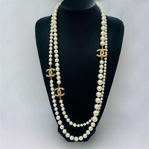 how to spot fake chanel pearl necklace|chanel pearl long strand necklaces.